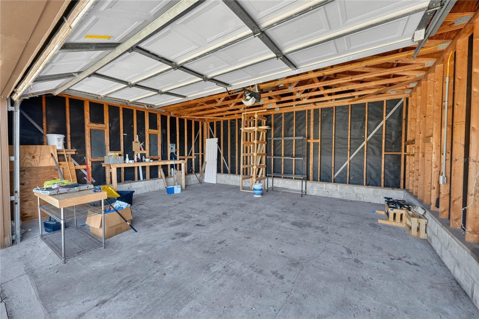 Garage - 116 W ARBORVITAE LN, POLK CITY