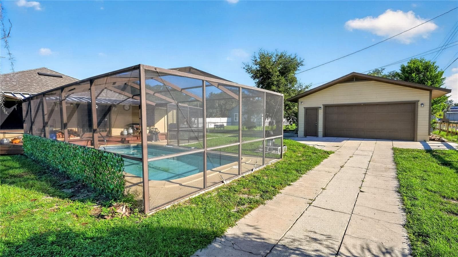 Driveway with Garage and Pool - 116 W ARBORVITAE LN, POLK CITY