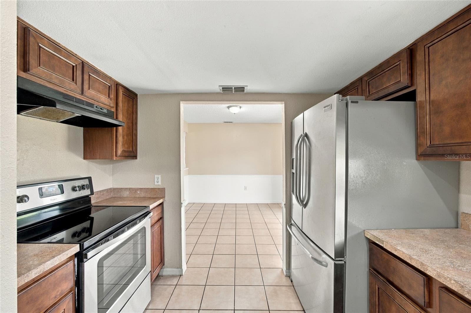 Kitchen/dining area - 7021 SHEFFIELD DR, LAKELAND