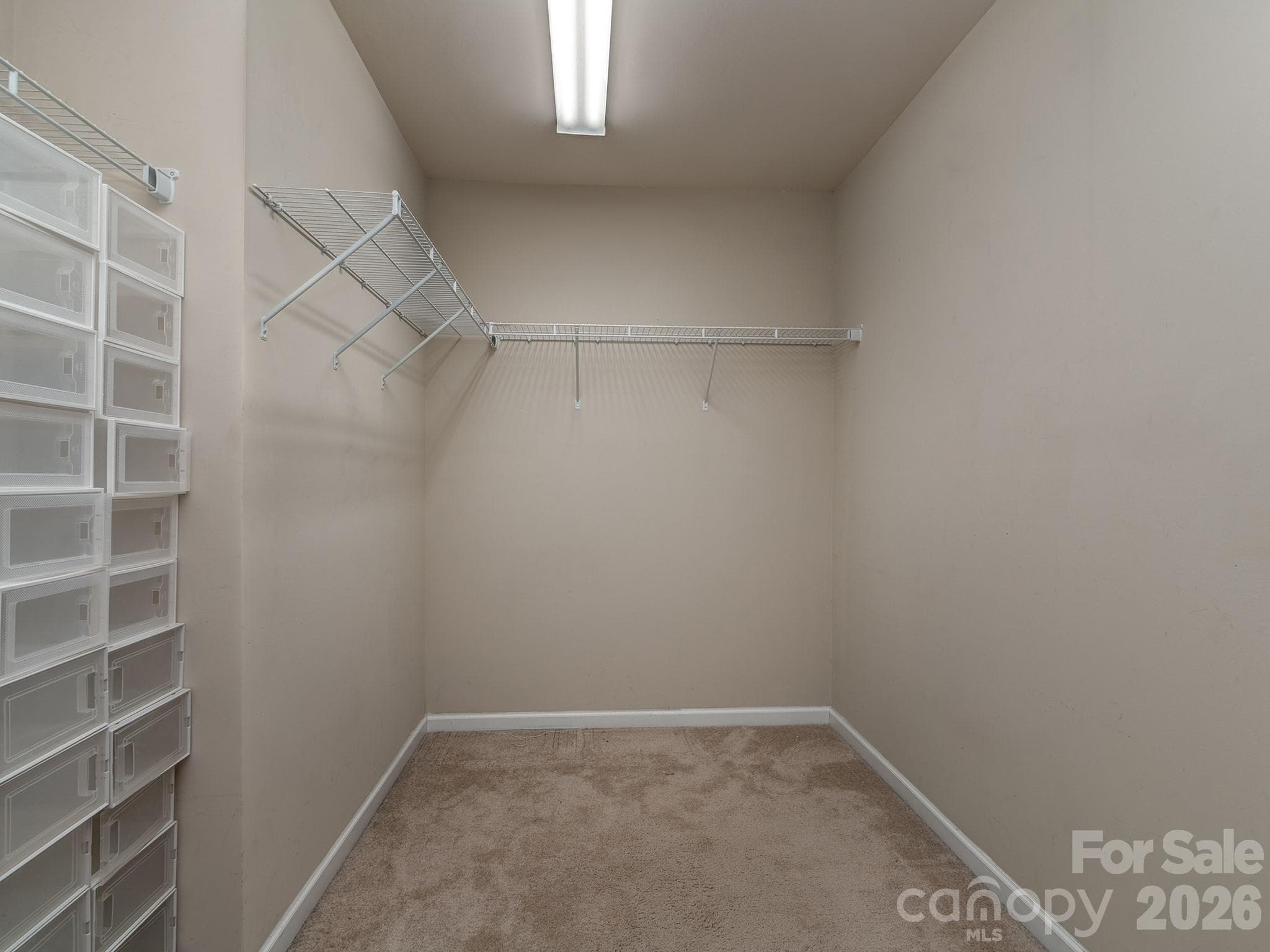 Primary bedroom walk in closet - 3831 Park South Station Boulevard, Charlotte