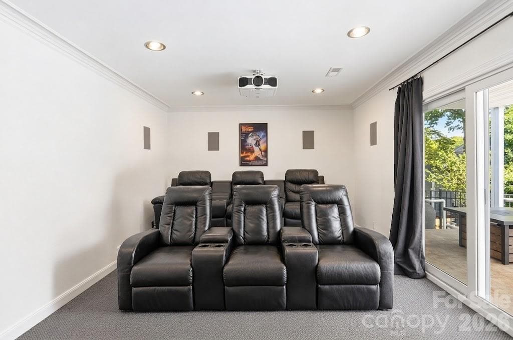 Movie night just got an upgrade! Enjoy your own theater room with a projector, big screen and theater-style seating. - 3022 Point Clear Drive, Tega Cay