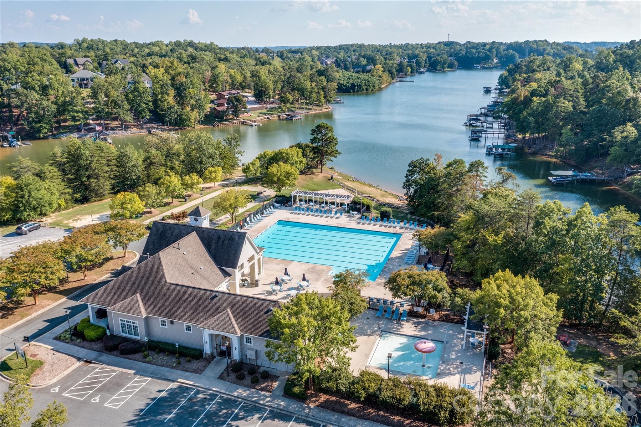 Community swimming pool available with membership—perfect for cooling off and enjoying sunny summer days! - 3022 Point Clear Drive, Tega Cay
