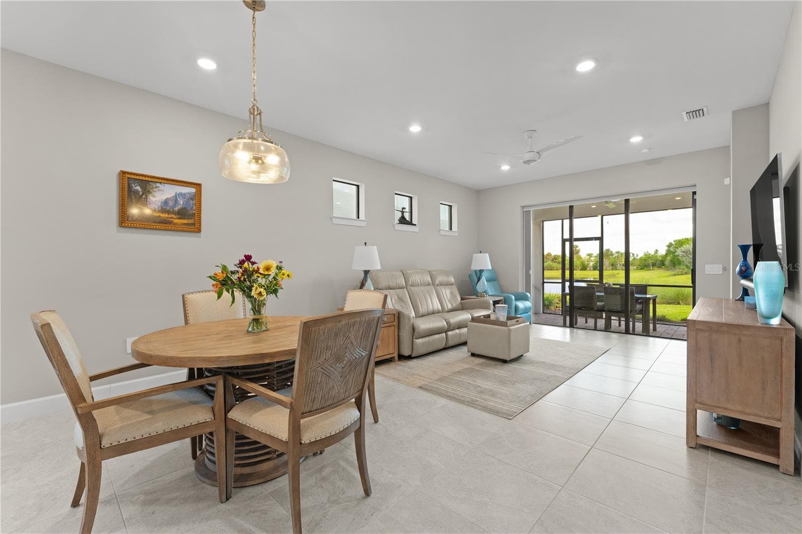 Living and dining combination. - 6332 WINDING PINE DR, NOKOMIS