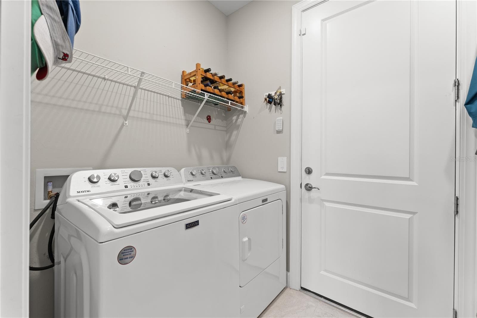Laundry, storage and wet sink in laundry. - 6332 WINDING PINE DR, NOKOMIS