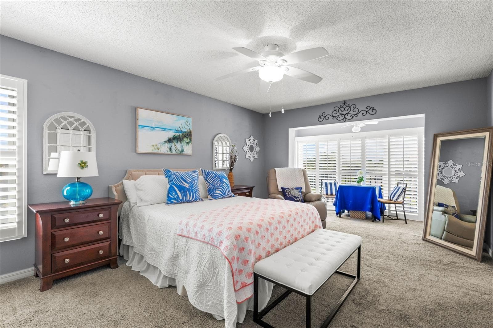 PRIMARY BEDROOM WITH PLANTATION SHUTTERS - 255 CAPRI CIR N #30, TREASURE ISLAND