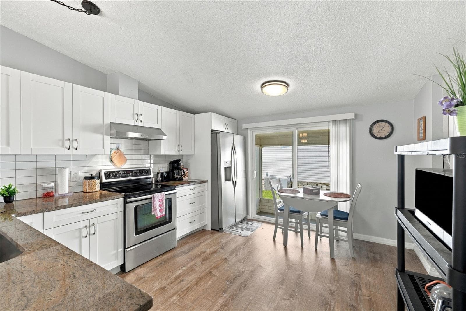 Kitchen includes high quality Level 2+ Granite! - 3041 SHORT LEAF ST, WESLEY CHAPEL