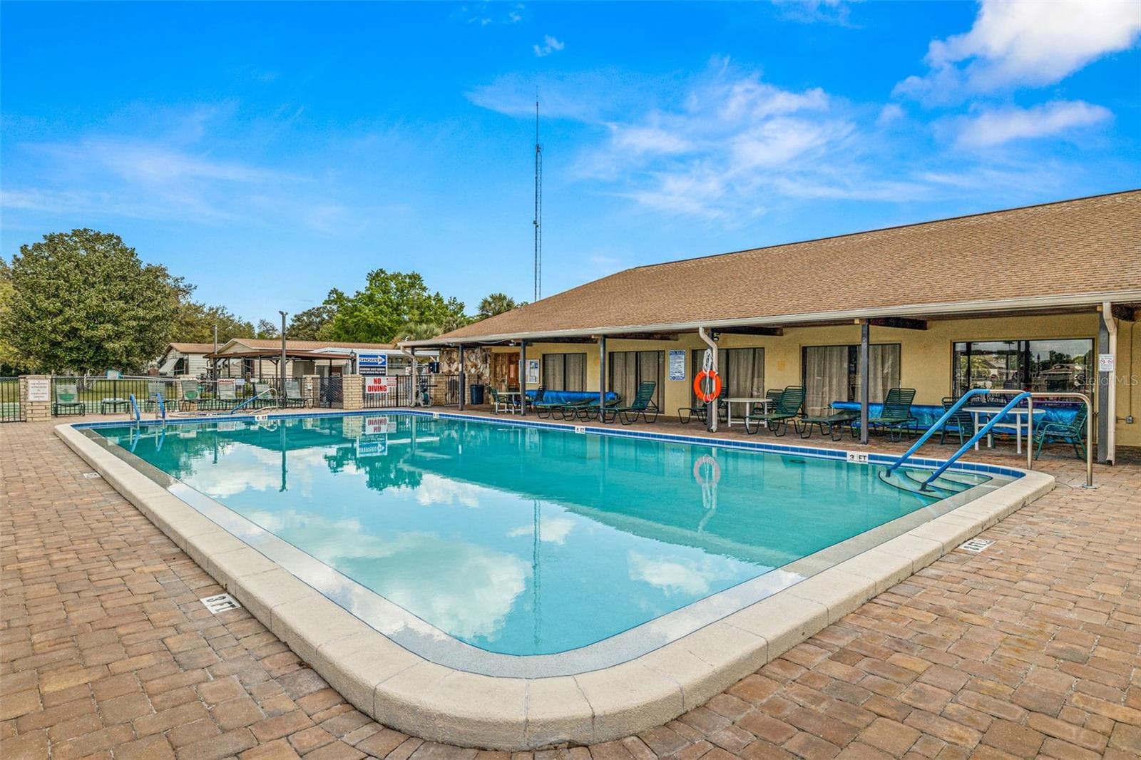 This gated community offers, two pools, basketball court, fishing, billiards room, clubhouse with activity groups as well as additional RV storage (as available). VERY low dues also include sewer, water, and trash! - 3041 SHORT LEAF ST, WESLEY CHAPEL