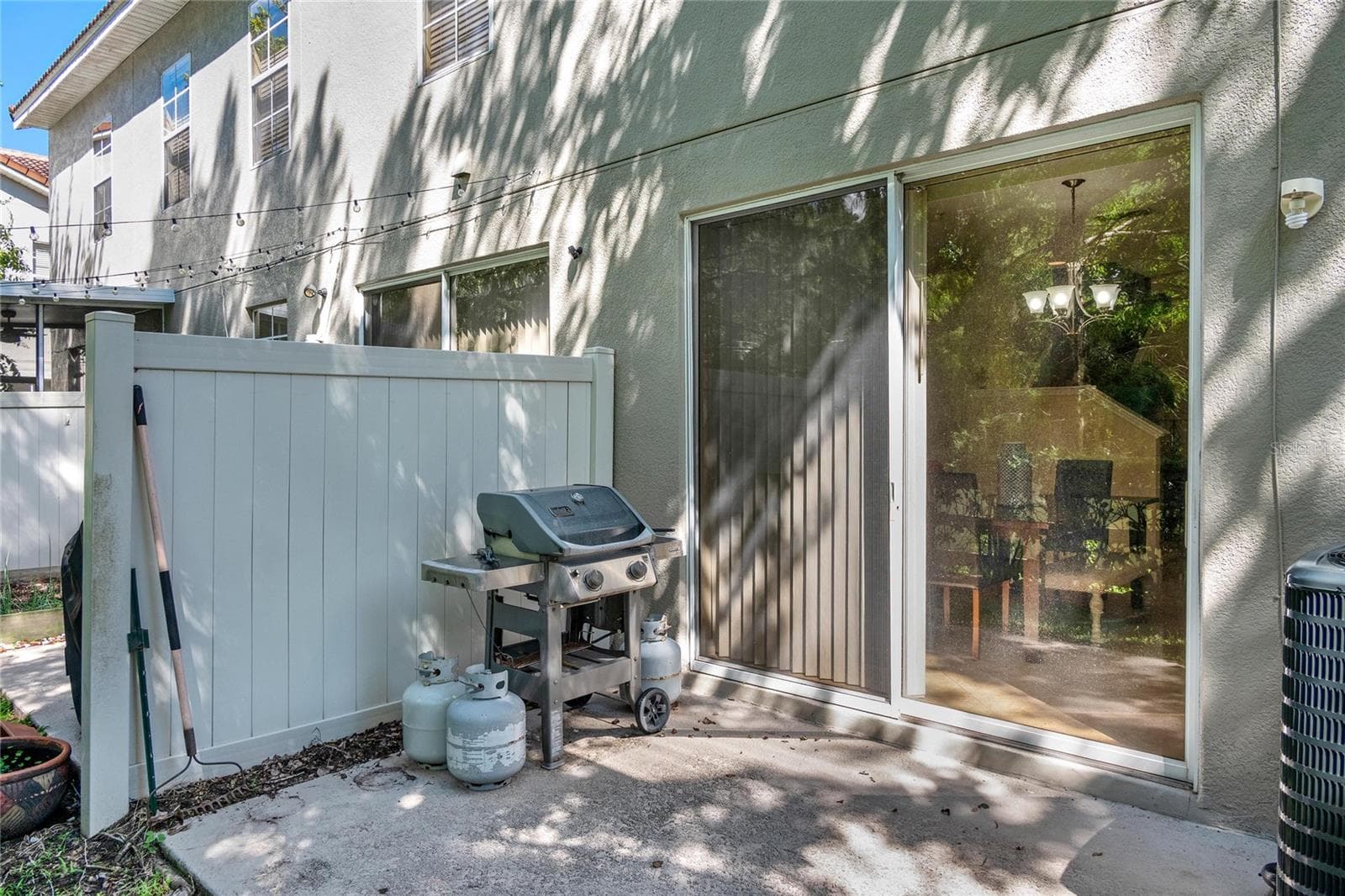 outside patio...lots of room for BBQs and seating - 104 CANTERBURY BELL DR, OVIEDO