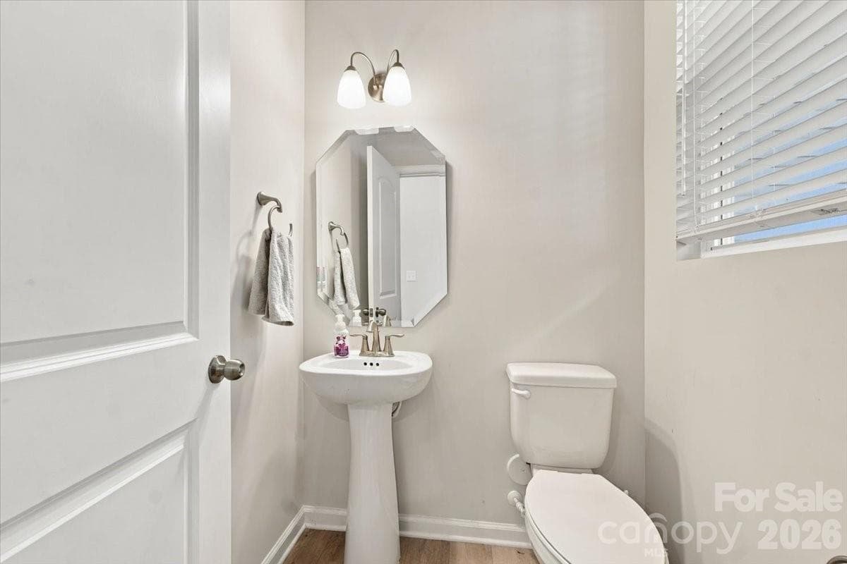 Half bath on main level - 8036 Overmeadow Lane, Charlotte