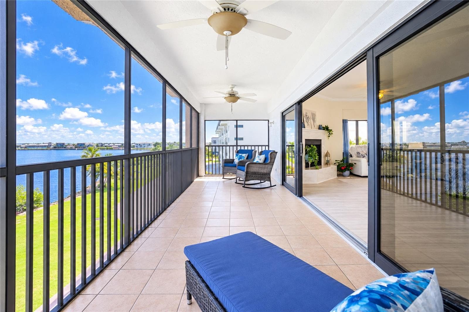 LARGE LANAI CAN HAVE SEVERAL SEATING ARRANGEMENTS - 1601 PARK BEACH CIR #136/18, PUNTA GORDA
