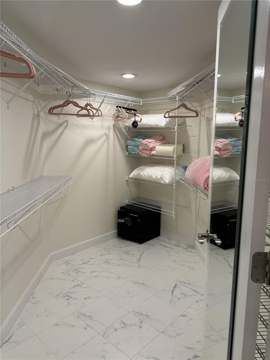 LARGE WALK IN CLOSET IN PRIMARY - 1601 PARK BEACH CIR #136/18, PUNTA GORDA
