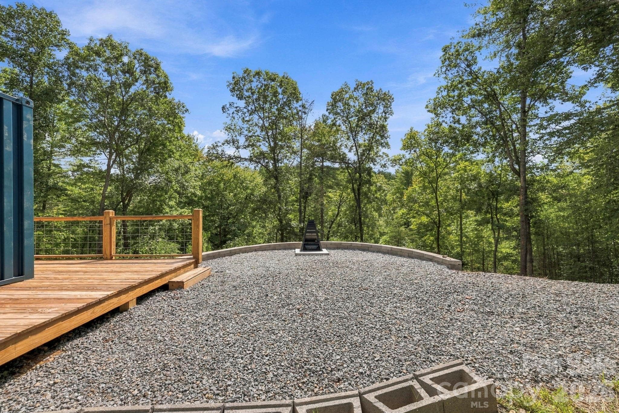 fire pit in front - 678 Forest Lake Heights Drive, Nebo