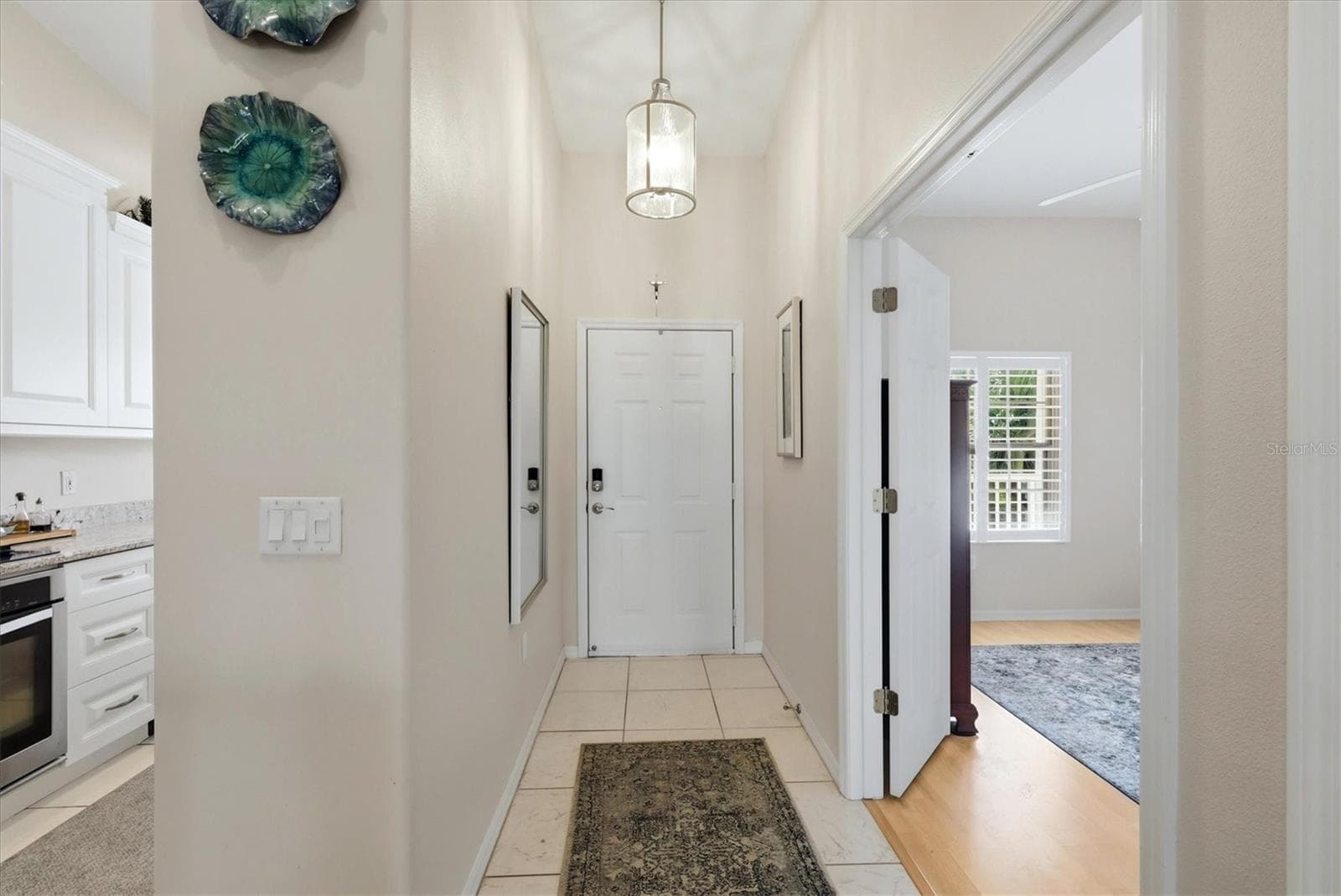 Interior front entrance with Second Bedroom and Kitchen. - 4256 CENTRAL SARASOTA PKWY #325, SARASOTA