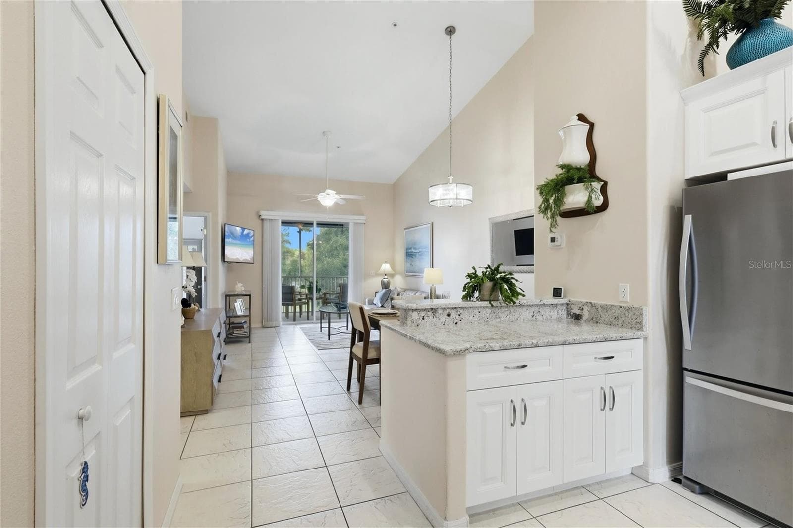 Looking out from the kitchen into the living area. - 4256 CENTRAL SARASOTA PKWY #325, SARASOTA