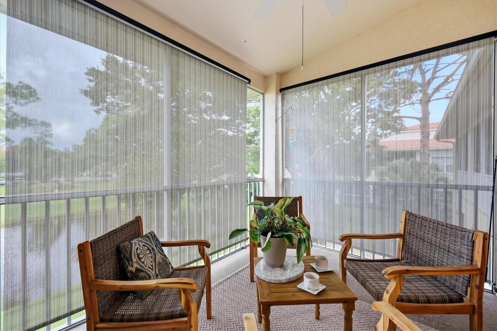 Sun shades and ceiling fan make the Lanai a pleasant place to gather the year through. - 4256 CENTRAL SARASOTA PKWY #325, SARASOTA