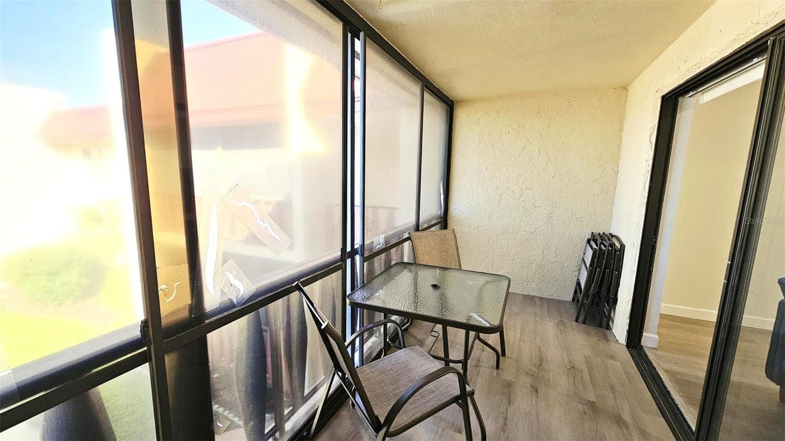 Screened lanai w/vinyl windows - 78 BOUNDARY BLVD #193, ROTONDA WEST