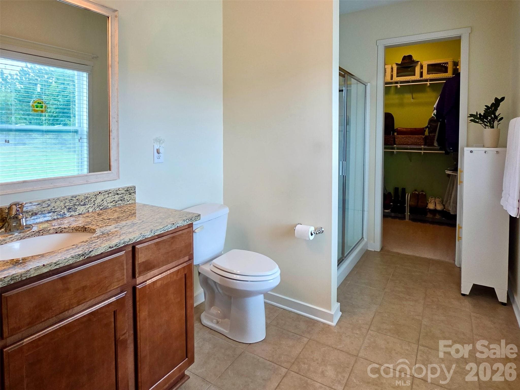 Primary Bathroom w Seated Shower and Walk-In Closet - Rock Hill