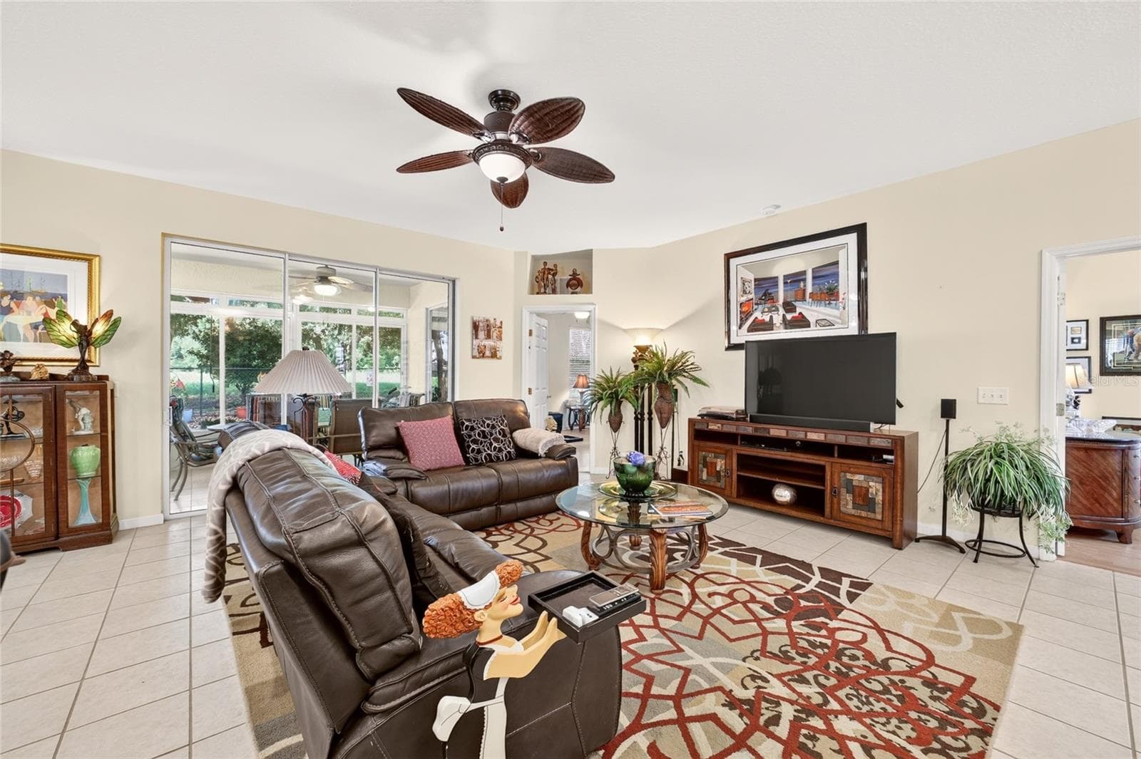 Sliders to the enclosed porch - 5891 NW 27TH PL, OCALA