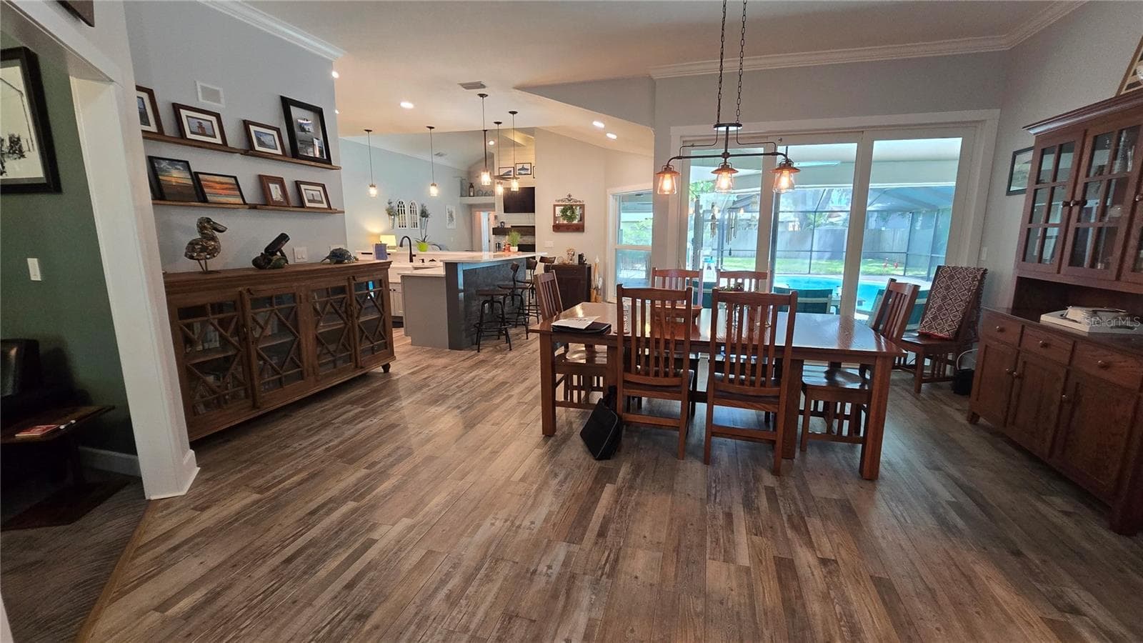 Large open floor plan with a formal dining room area or could be converted to a huge living room with the family room being in the rear of the home. - 9991 WINDTREE BLVD, SEMINOLE