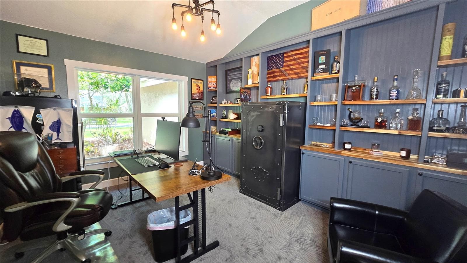 This office is perfect for those who work from home or may just want a gaming room.  It very spacious with lots of shelves and cabinets. - 9991 WINDTREE BLVD, SEMINOLE