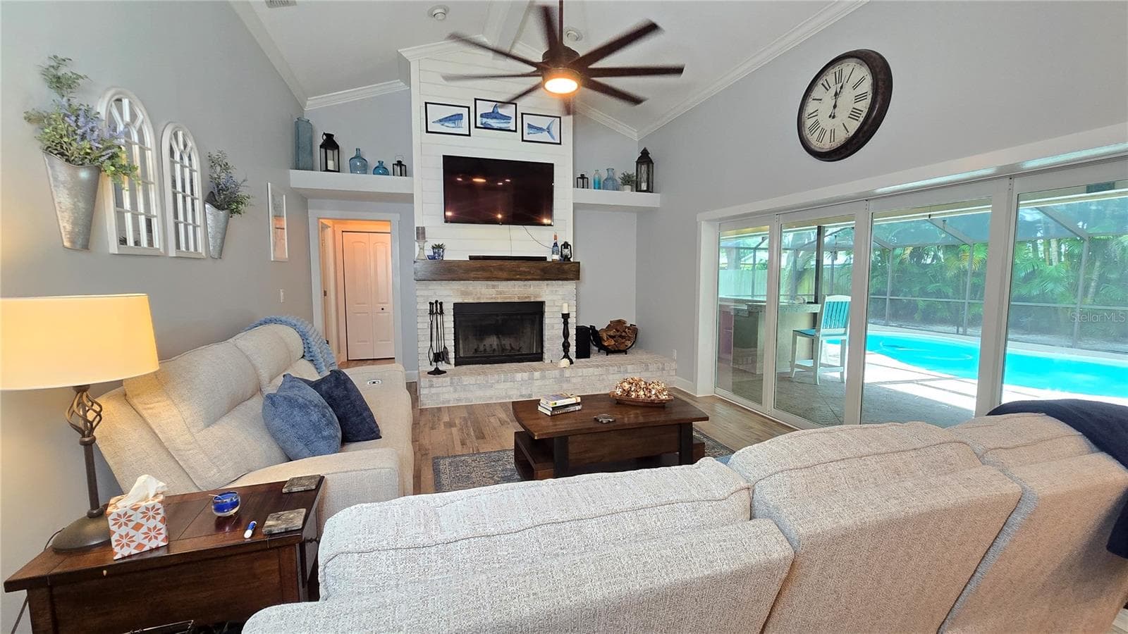 Wood burning fireplace located in the Family Room.  Last year (Nov 2025) owners said they had the fireplace cleaned professionally - 9991 WINDTREE BLVD, SEMINOLE