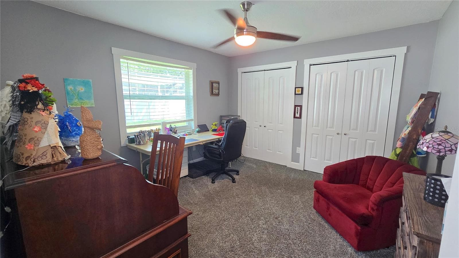 Bedroom with 2 closets. - 9991 WINDTREE BLVD, SEMINOLE