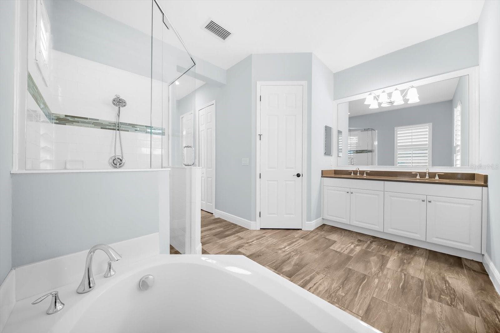Primary Suite Bathroom with Private Water Closet - 8256 LARKSPUR CIR, SARASOTA