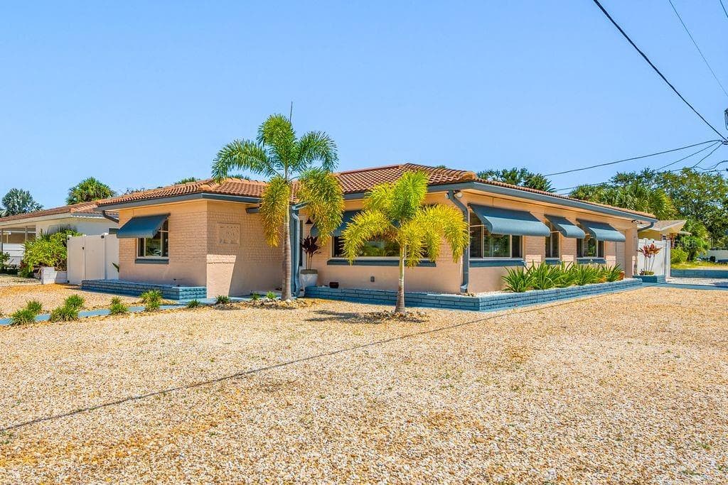 Front Door Entrance is located on Durling Dr. and the Side Facing Garage is located on Pasadena Shores Dr. S. - 1472 DURLING DR S, SOUTH PASADENA