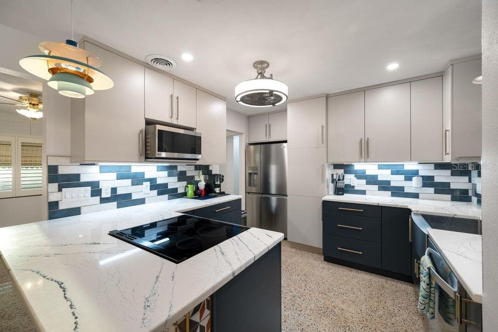 New Two Tone KitchenCraft Cabinets - Quartz Countertops and Pretty Tile Backsplash - 1472 DURLING DR S, SOUTH PASADENA