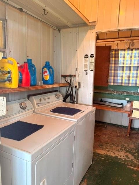 UTILITY ROOM WITH WASHER AND DRIVER - 84 CEDAR ELM DR #28, SAFETY HARBOR