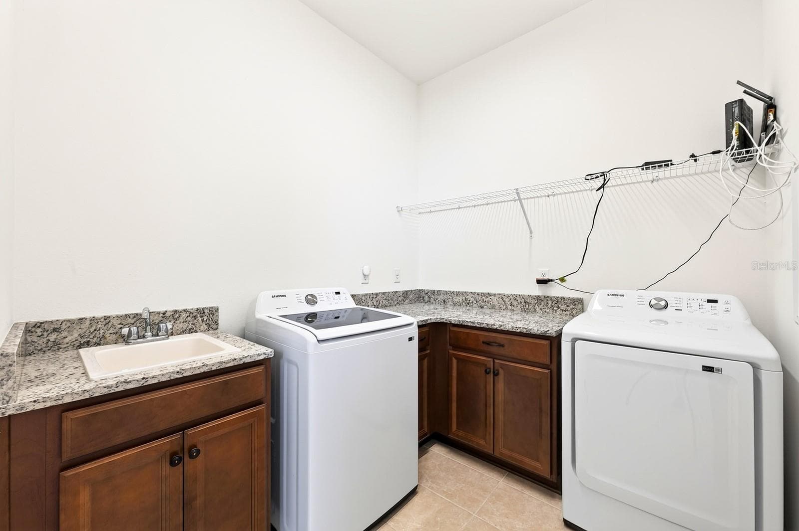 Large laundry room. - 13472 PADSTOW PL, ORLANDO