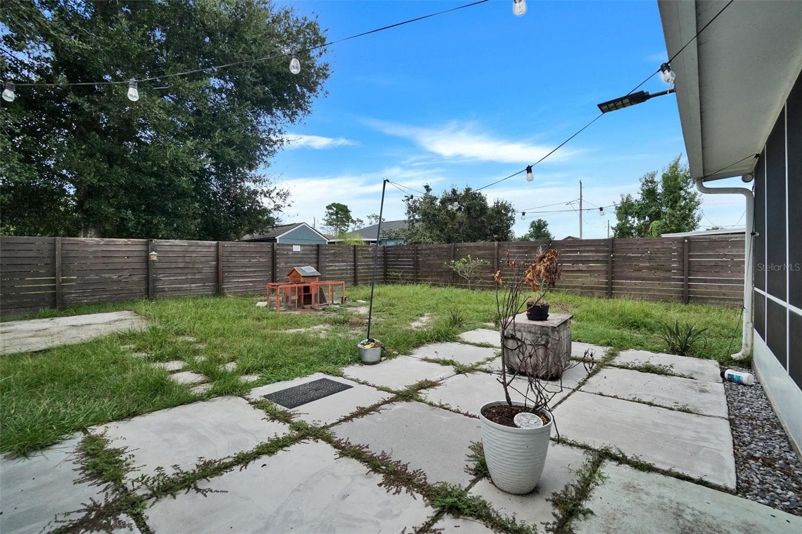 OPEN CEMENT PATIO / BACKYARD - 3046 BLAINE CIR, DELTONA