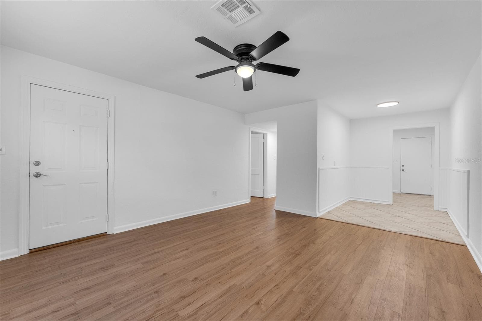 Open living room and dining room - 1104 E HARWOOD ST, ORLANDO