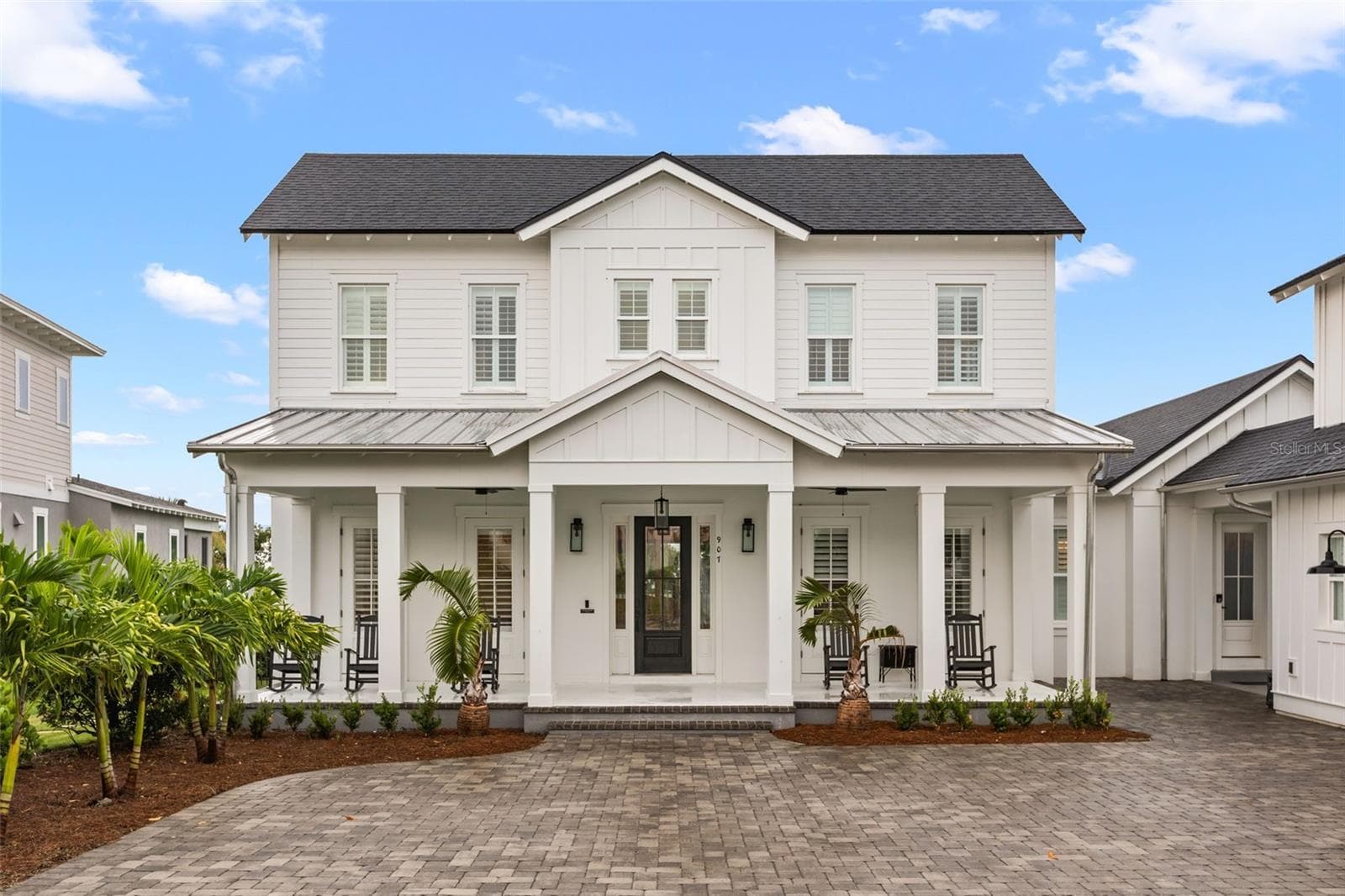 OLD FLORIDA ARCHITECTURE | MAIN RESIDENCE.A wide front porch and classic detailing define this residence in Oakland Park. - 907 CELADON ST, WINTER GARDEN