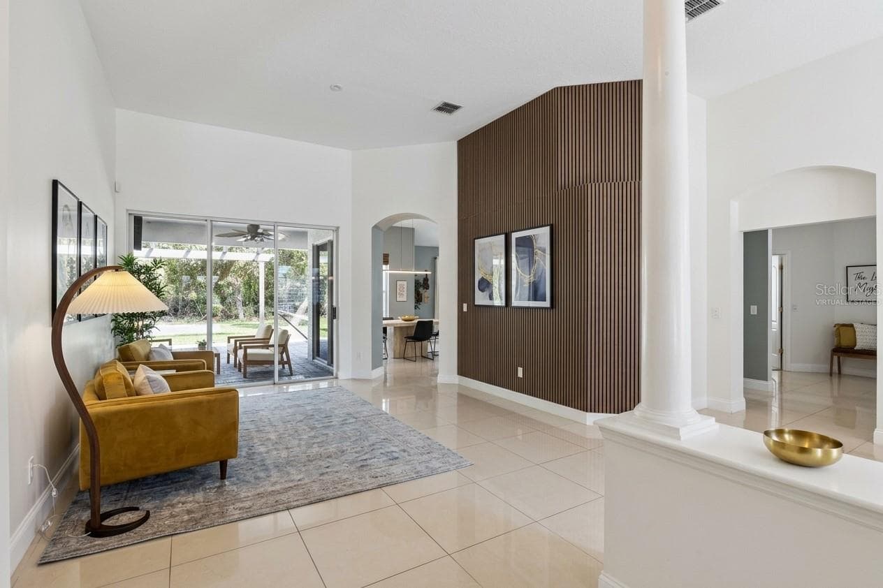 Virtually Staged Living Room - 9041 LAUREL RIDGE DR, MOUNT DORA