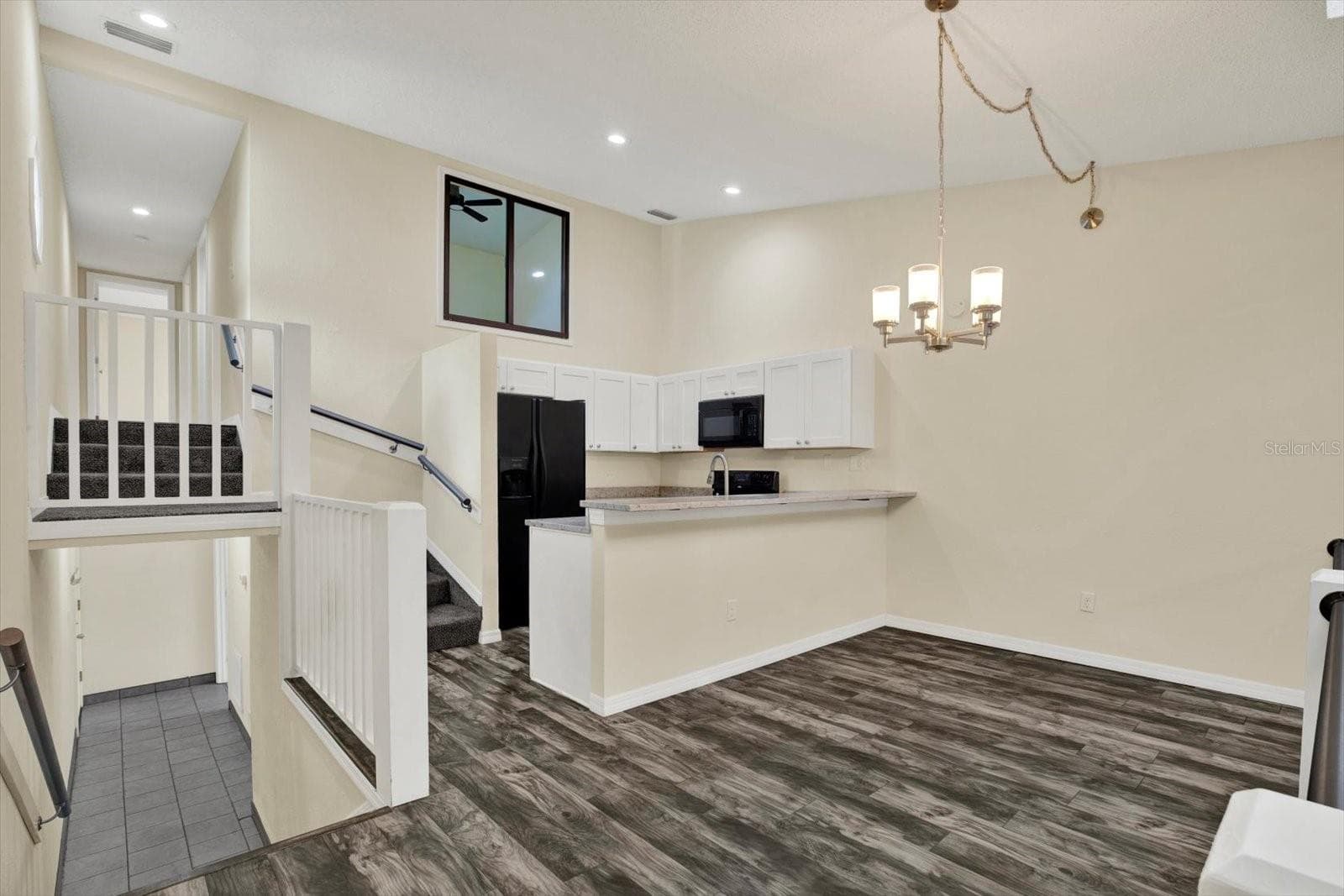 2ND LEVEL KITCHEN-DINING-LIVING -ENTERTAINERS DELIGHT - 6410 92ND PL N #1401, PINELLAS PARK