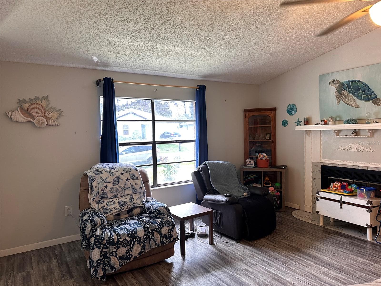 Great room and fireplace - 891 MERRIMAC ST SE, PALM BAY