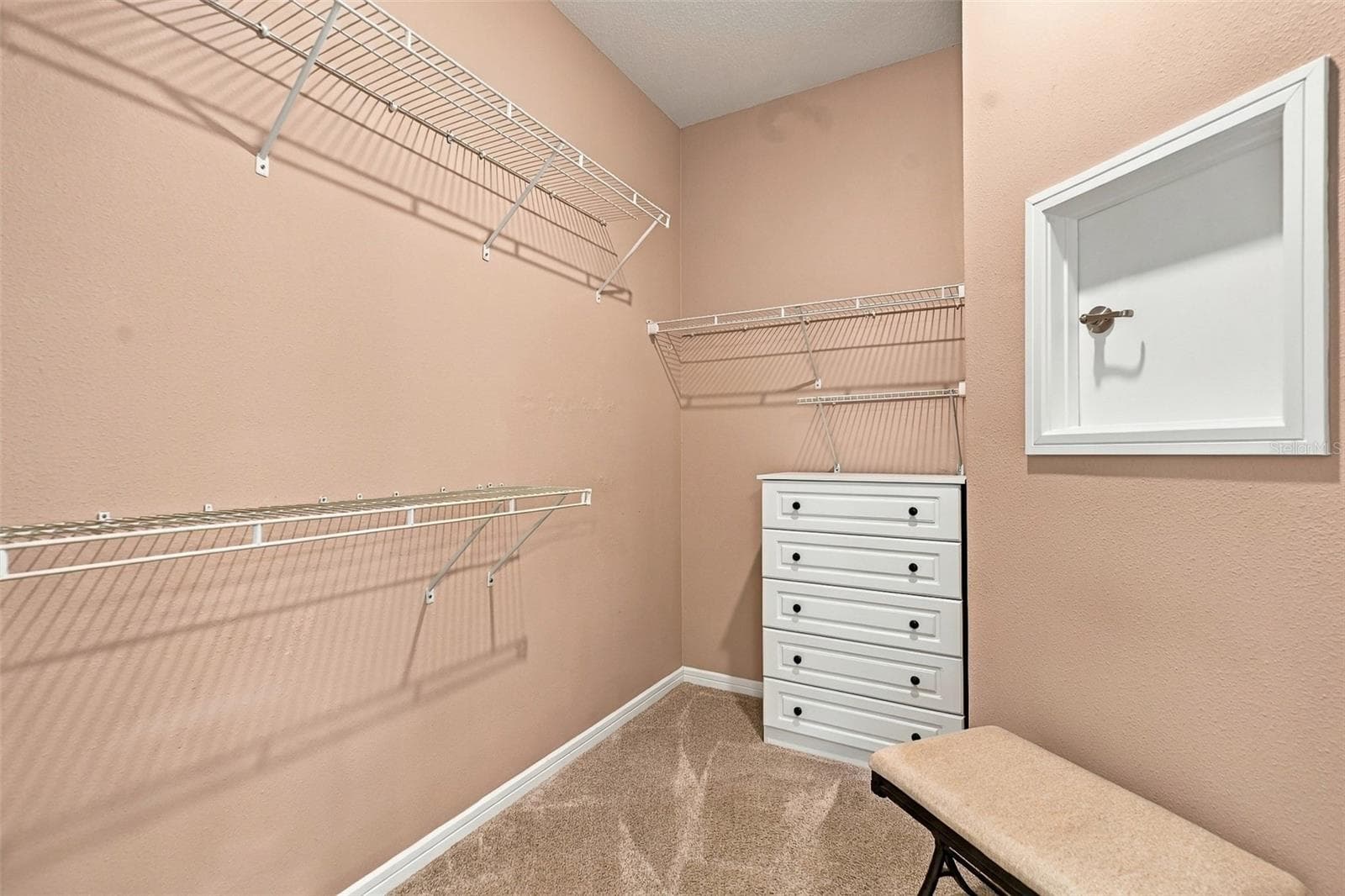 Large Primary closet w/laundry chute door - 5995 SW 93RD CIR, OCALA
