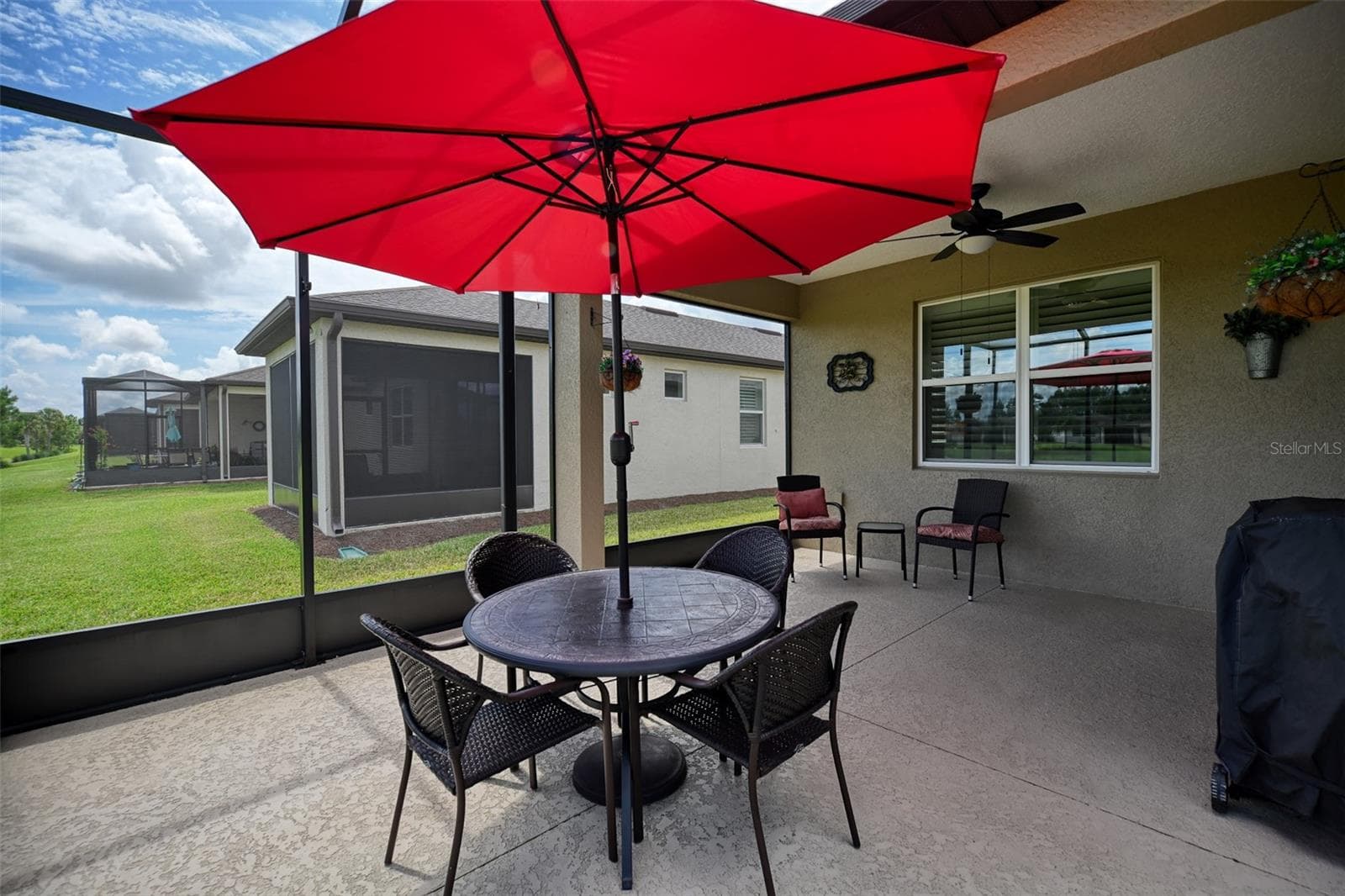 Covered screened lanai w/additional screen cage - 5995 SW 93RD CIR, OCALA