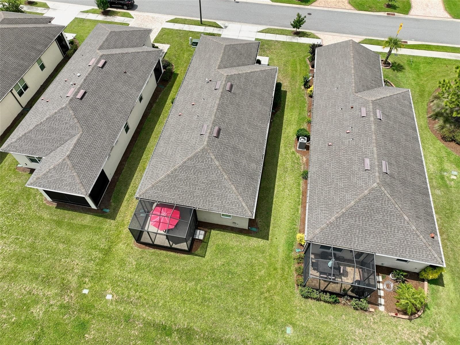 Aerial view from rear of home (red umbrella visible in screened cage) - 5995 SW 93RD CIR, OCALA