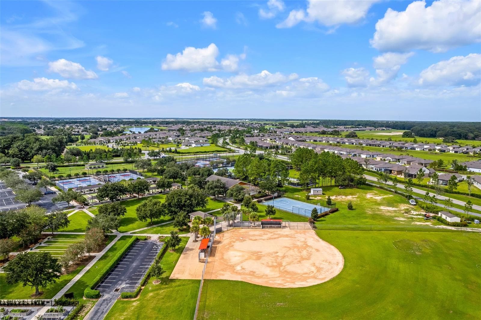Stone Creek main sport court amenity complex w/ softball field, snack bar, basketball court & pavilion - 5995 SW 93RD CIR, OCALA