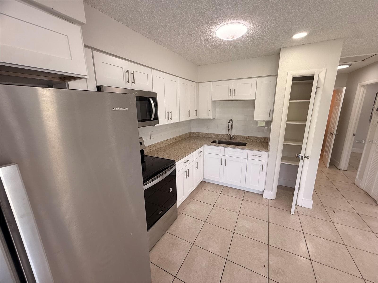 Half Duplex at 10123 N 11TH ST #B, TAMPA, photo 8 of 25