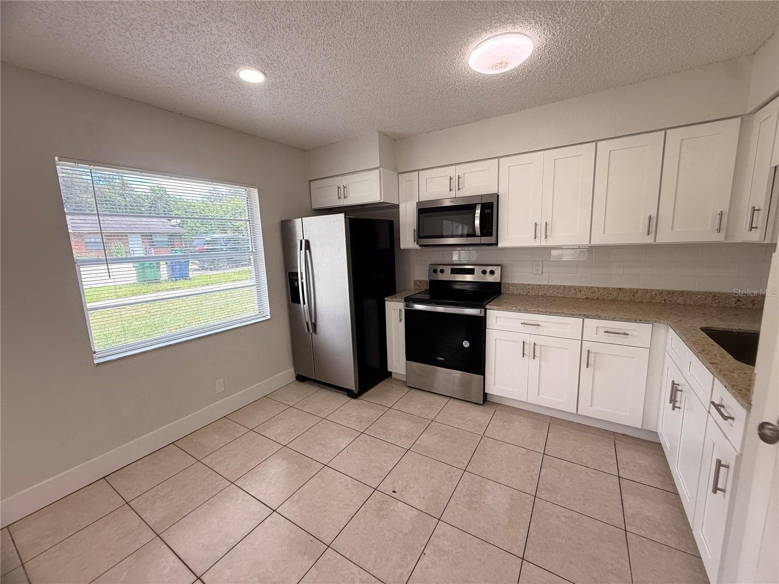 Half Duplex at 10123 N 11TH ST #B, TAMPA, photo 9 of 25