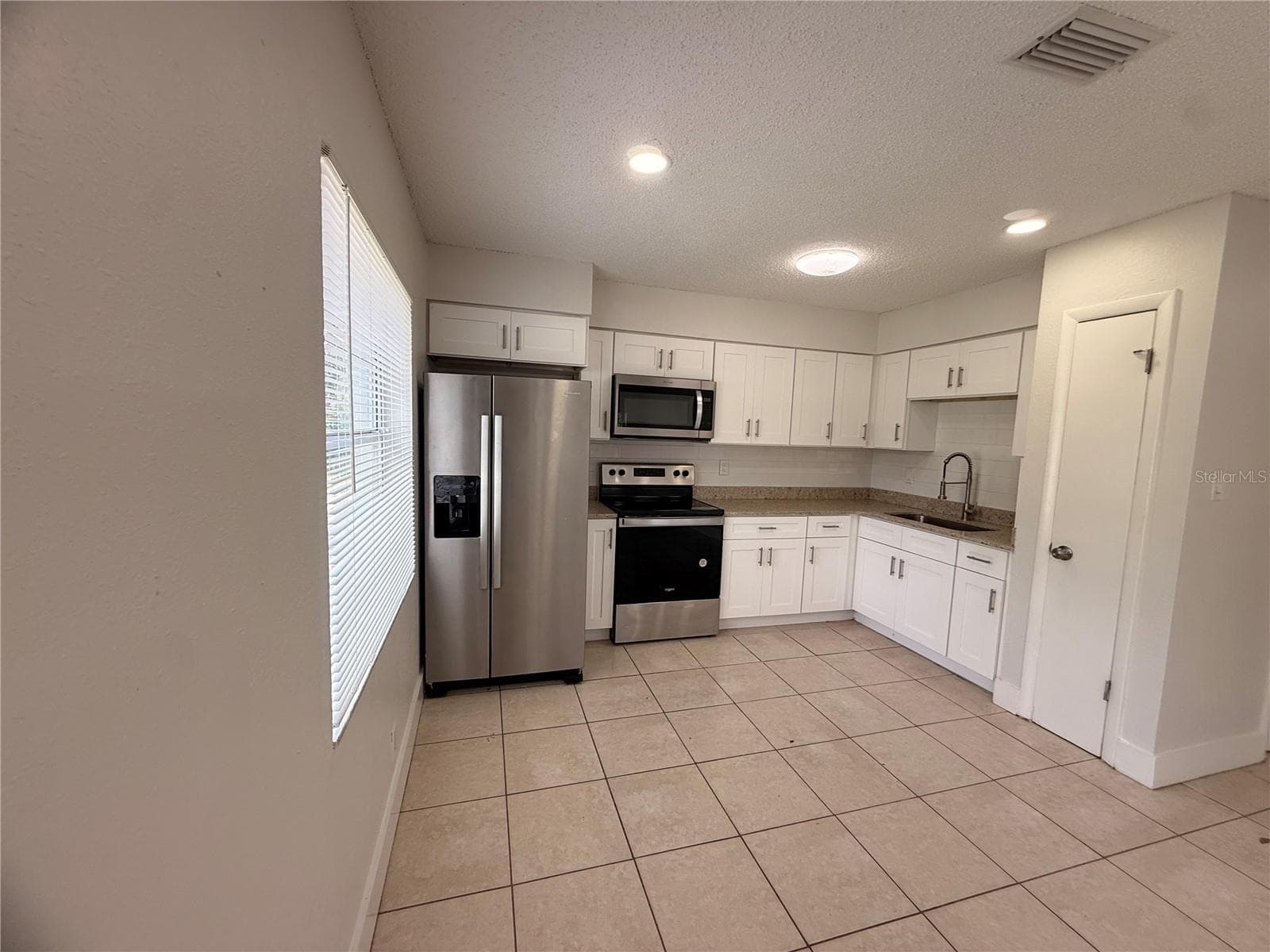 Half Duplex at 10123 N 11TH ST #B, TAMPA, photo 11 of 25
