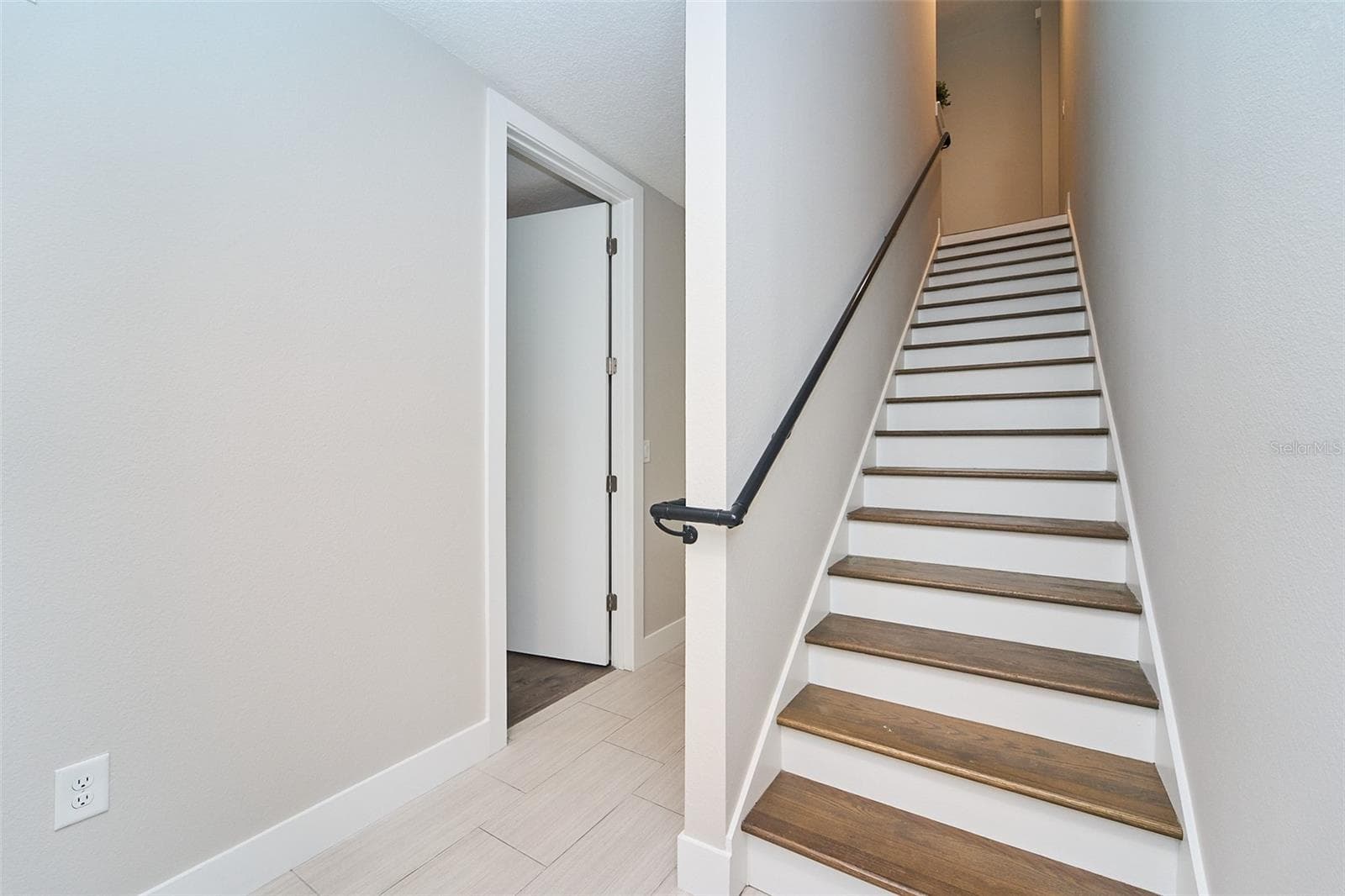 staircase to 2nd floor - 136 8TH ST N, ST PETERSBURG