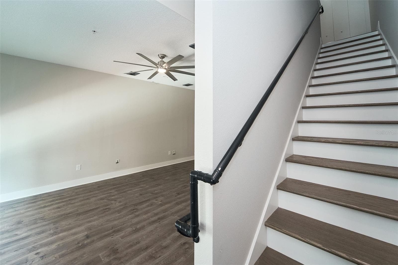staircase going to the 3rd floor - 136 8TH ST N, ST PETERSBURG
