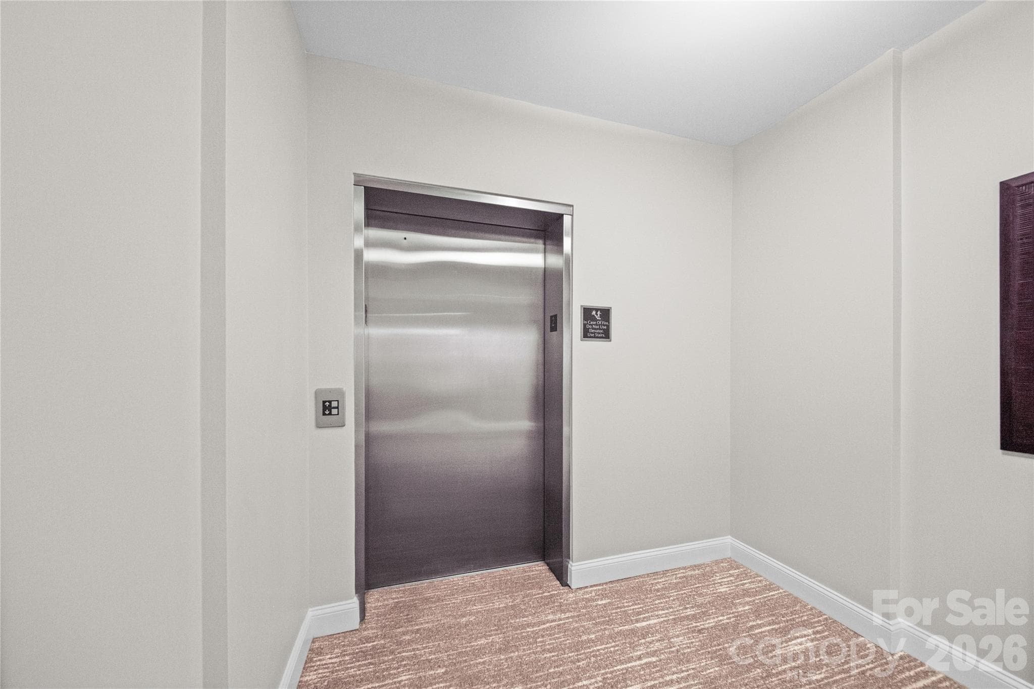 Parking spot accessed from elevator to P1 - 300 W 5th Street, Charlotte