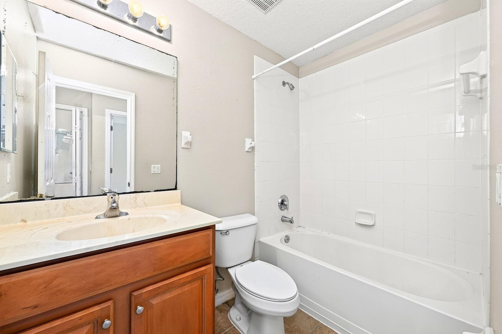 Second full bath. - 4559 LACEBARK TRL, OVIEDO