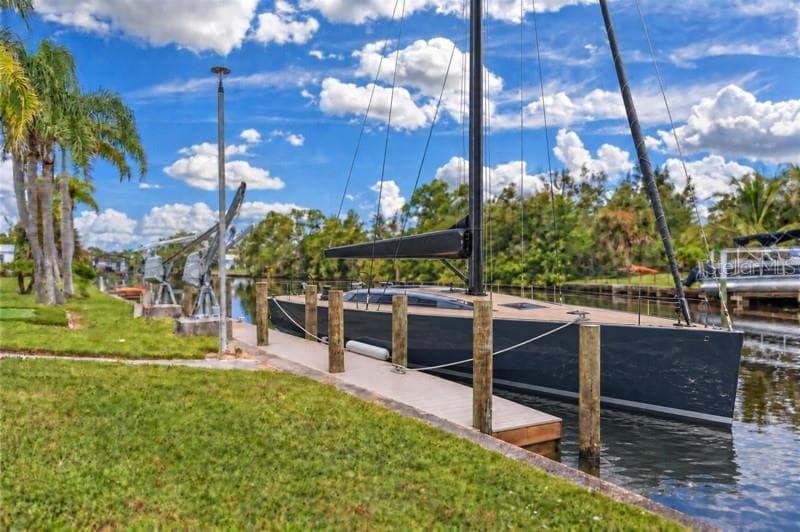 The sailboat is a virtual depiction of what could be kept behind the house. - 15180 LYNEBURG AVE, PORT CHARLOTTE
