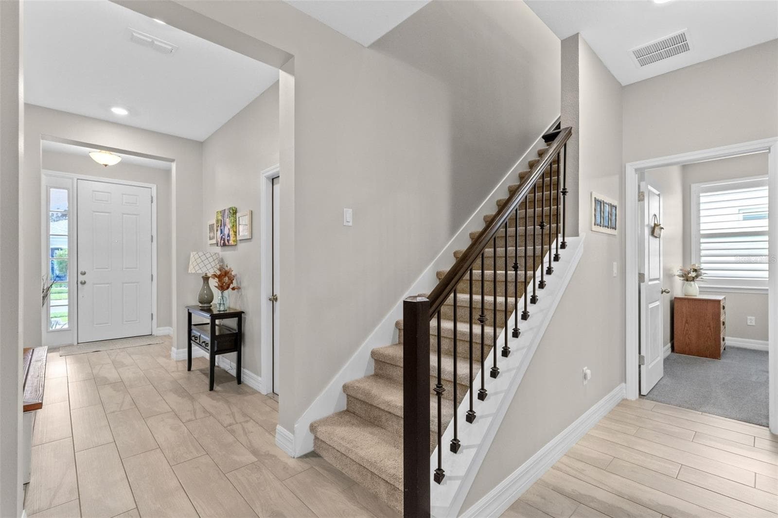 Foyer view & staircase to second floor - 1274 SILO DR, ST CLOUD